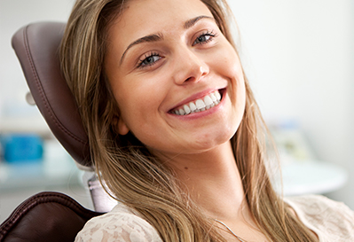 Smiling woman in chair